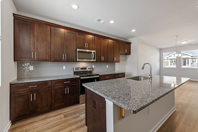 UNIT2 Grove Loop, Blue Ridge, GA 30513 - kitchen featuring stainless steel appliances, a sink, light wood-style floors, backsplash, and recessed lighting