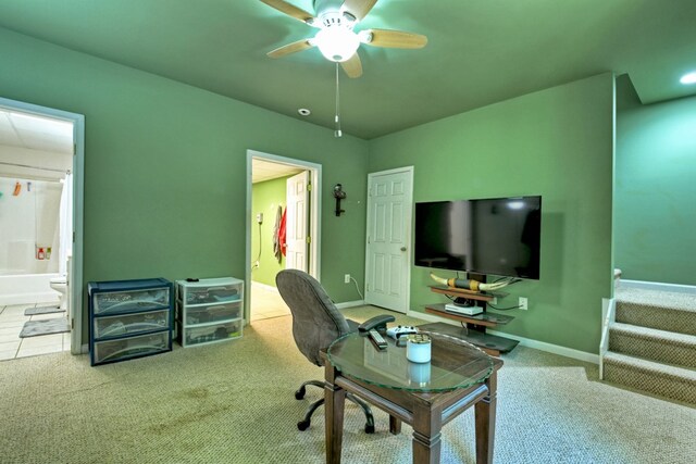 home office featuring ceiling fan and carpet flooring