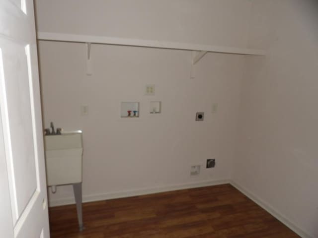 laundry area featuring hookup for a washing machine, electric dryer hookup, and dark wood-type flooring