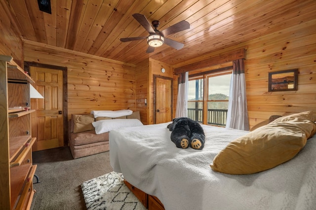 carpeted bedroom with wooden walls, ceiling fan, wood ceiling, and access to outside