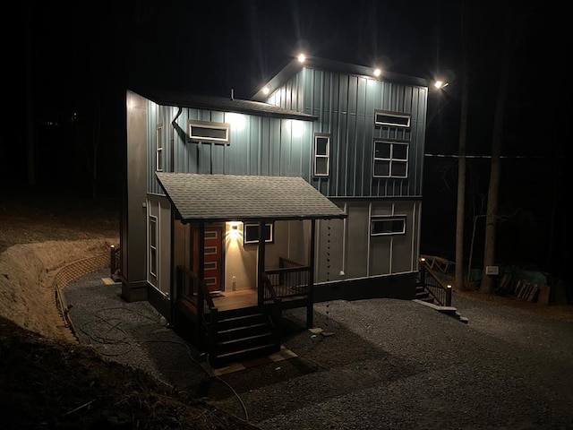 view of back house at night