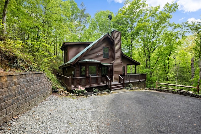 view of front of property featuring a chimney