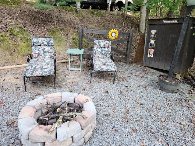 view of patio / terrace featuring a fire pit