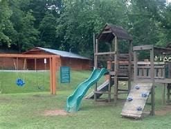 view of playground with a yard