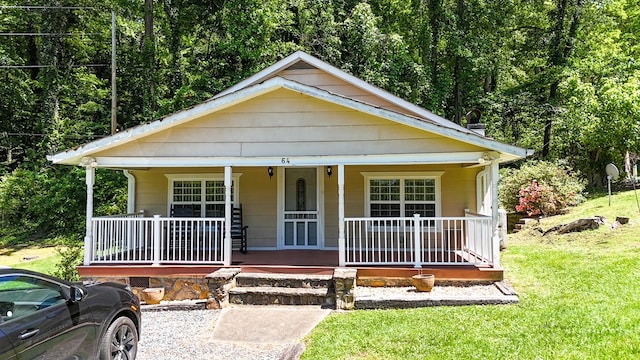 64 Cloe Moore Dr, Murphy, NC 28906 - bungalow-style home featuring a porch and a front lawn