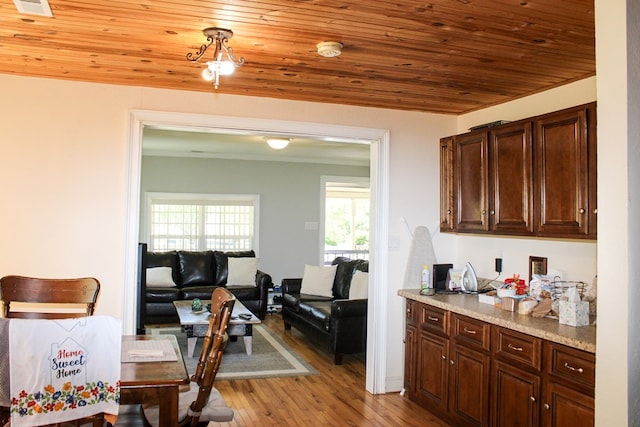 64 Cloe Moore Dr, Murphy, NC 28906 - dining room featuring light wood-style flooring, wood ceiling, and ornamental molding