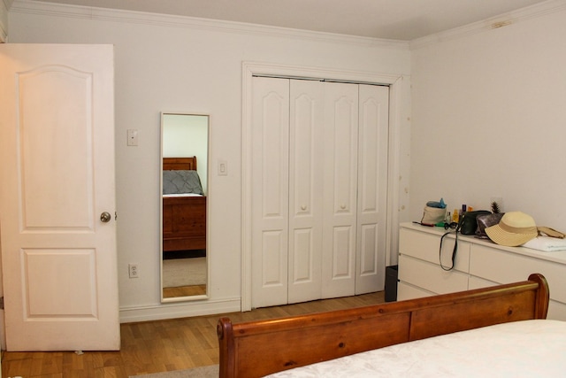 64 Cloe Moore Dr, Murphy, NC 28906 - bedroom featuring light wood-style flooring, ornamental molding, and a closet