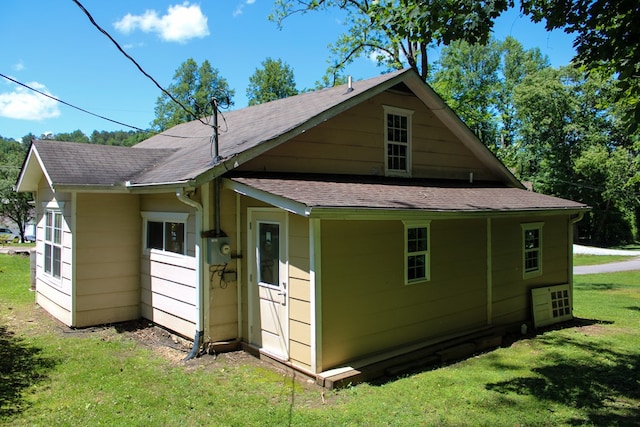 64 Cloe Moore Dr, Murphy, NC 28906 - rear view of house with a lawn and roof with shingles
