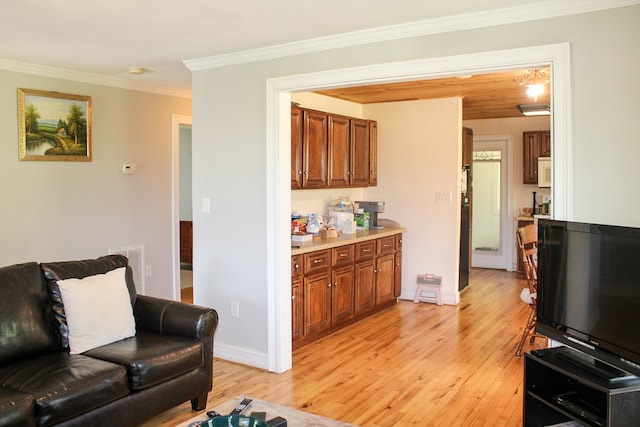 64 Cloe Moore Dr, Murphy, NC 28906 - living room featuring light wood-style floors, ornamental molding, and baseboards