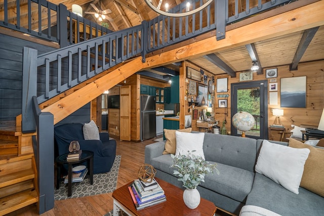 121 Farmstead Rd, Ellijay, GA 30540 - living room featuring wooden walls, hardwood / wood-style flooring, wood ceiling, and stairway