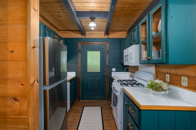 121 Farmstead Rd, Ellijay, GA 30540 - kitchen with wood ceiling, tile countertops, dark wood finished floors, beam ceiling, and white appliances