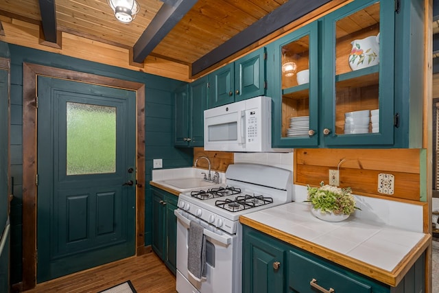 121 Farmstead Rd, Ellijay, GA 30540 - kitchen featuring a sink, white appliances, tile counters, beamed ceiling, and wood ceiling