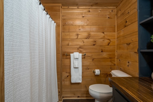 121 Farmstead Rd, Ellijay, GA 30540 - bathroom with toilet, wood walls, a shower with shower curtain, and vanity