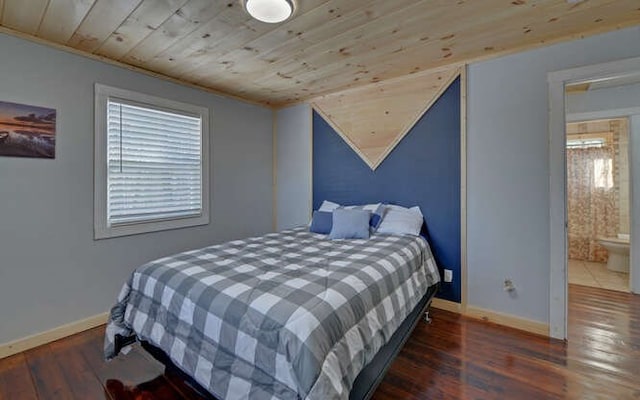 bedroom featuring wooden ceiling, dark hardwood / wood-style floors, and ensuite bathroom