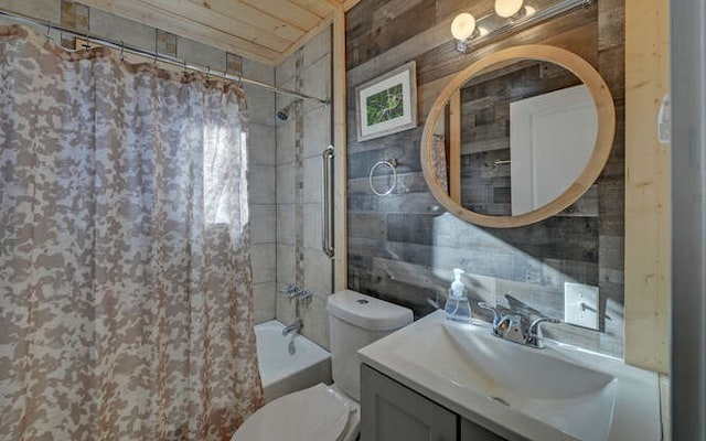 full bathroom with toilet, vanity, wood ceiling, and shower / tub combo with curtain