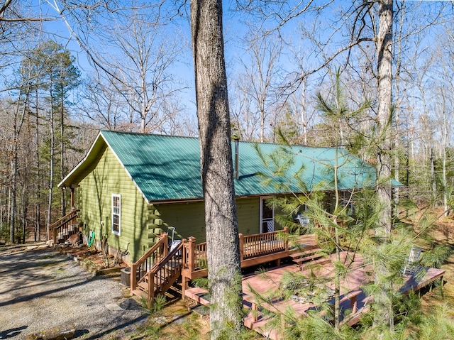 922 Liberty Cir, Murphy, NC 28906 - view of side of home featuring stairs, log exterior, a deck, and metal roof