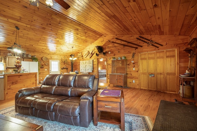 922 Liberty Cir, Murphy, NC 28906 - living area featuring wood ceiling, a ceiling fan, wood walls, light wood finished floors, and vaulted ceiling with beams