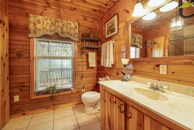 922 Liberty Cir, Murphy, NC 28906 - half bathroom featuring wooden walls, toilet, tile patterned flooring, and vanity