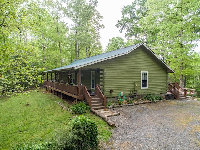 922 Liberty Cir, Murphy, NC 28906 - view of front of home featuring crawl space, a front lawn, covered porch, and log exterior