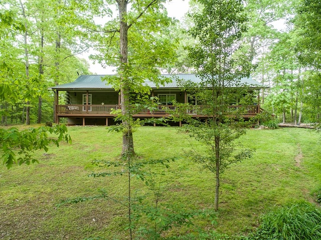 view of yard with a wooden deck