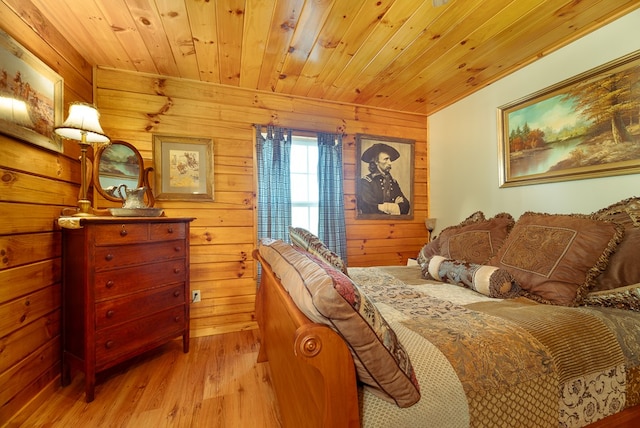 922 Liberty Cir, Murphy, NC 28906 - bedroom with wooden walls, wood ceiling, and light wood-type flooring