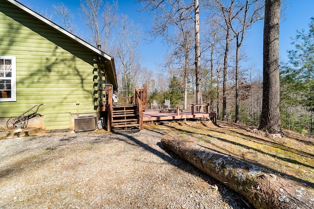 view of yard featuring a wooden deck