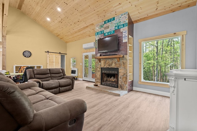 living room featuring a wall unit AC, high vaulted ceiling, wood finished floors, wood ceiling, and a fireplace