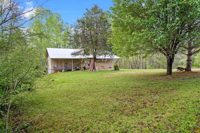 view of yard with a porch