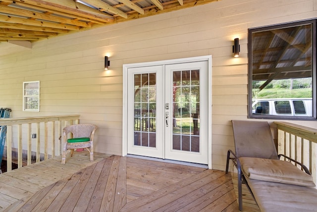 wooden deck featuring french doors