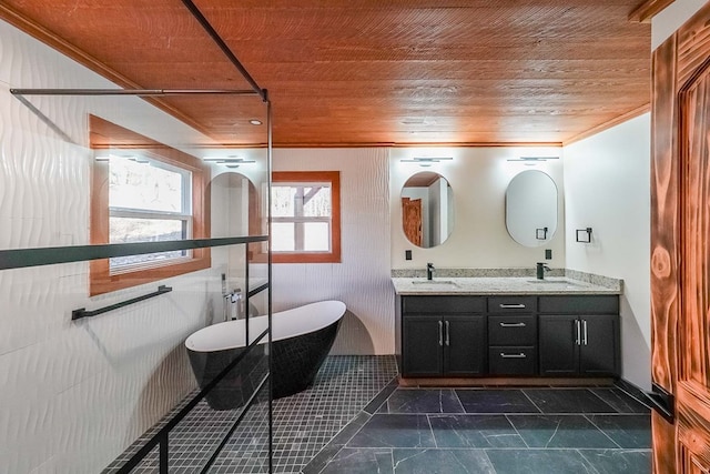 bathroom with a tub to relax in, ornamental molding, wood ceiling, vanity, and tile patterned flooring