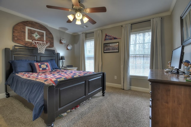 carpeted bedroom with ceiling fan, ornamental molding, and multiple windows