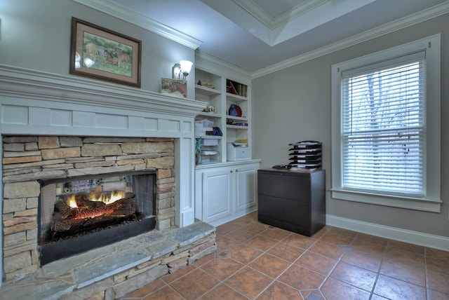 details with crown molding, a stone fireplace, a tray ceiling, and built in shelves