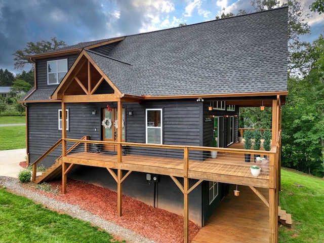 784 Sneaking Creek Dr, Hayesville, NC 28904 - view of front of home with a deck, roof with shingles, and a front yard