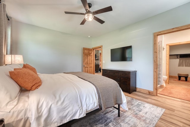 784 Sneaking Creek Dr, Hayesville, NC 28904 - bedroom with light wood-type flooring, connected bathroom, and ceiling fan