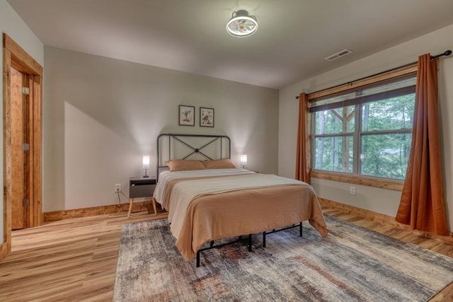 784 Sneaking Creek Dr, Hayesville, NC 28904 - bedroom featuring light wood-style floors and baseboards