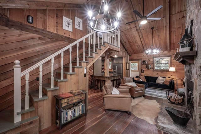 240 Donna Lee Ln, Mineral Bluff, GA 30559 - living room with wooden walls, hardwood / wood-style flooring, stairs, a chandelier, and vaulted ceiling