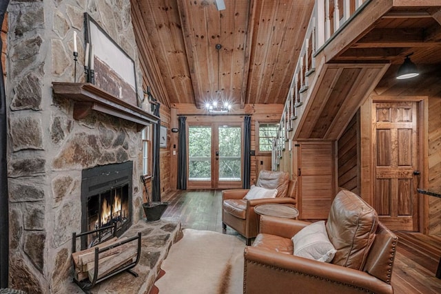 240 Donna Lee Ln, Mineral Bluff, GA 30559 - living room featuring wooden ceiling, hardwood / wood-style floors, a stone fireplace, wood walls, and lofted ceiling