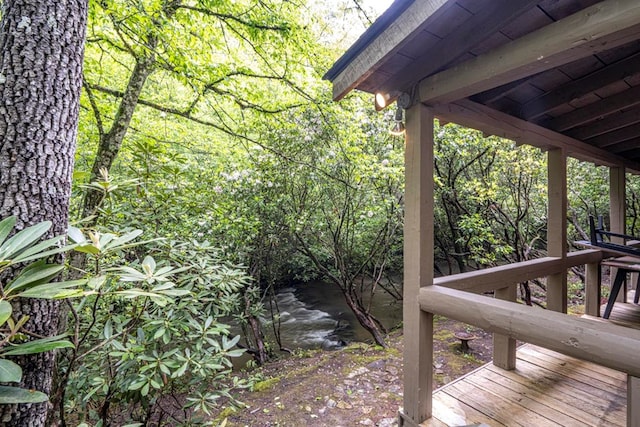 240 Donna Lee Ln, Mineral Bluff, GA 30559 - wooden terrace featuring a wooded view