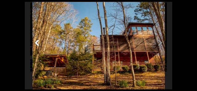 view of play area with a wooden deck