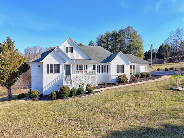 view of front of property with a front lawn and a porch