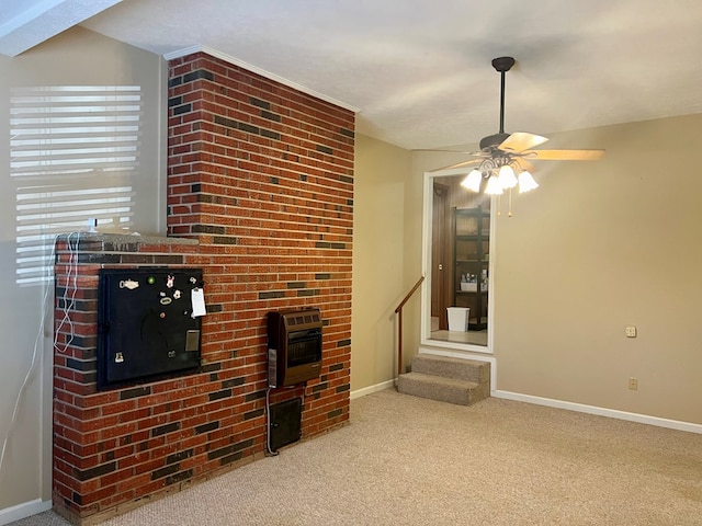 carpeted living room featuring ceiling fan and heating unit