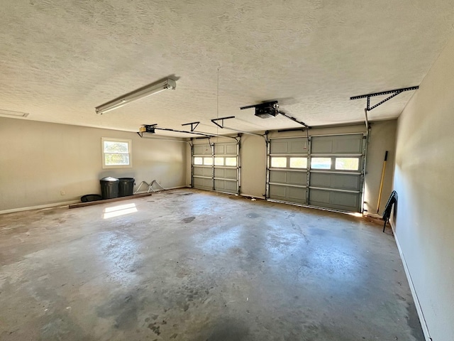 136 Ashe Knob Dr, Hayesville, NC 28904 - garage with a garage door opener and baseboards