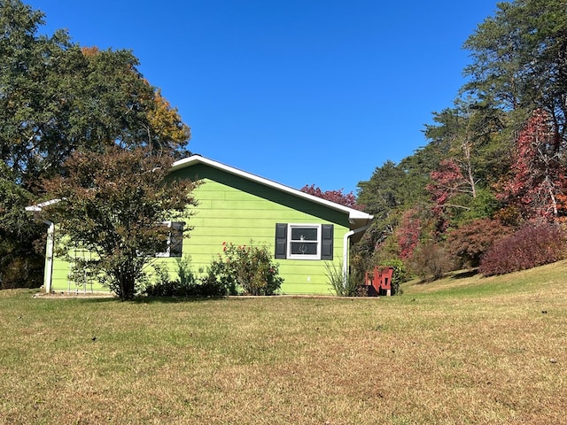136 Ashe Knob Dr, Hayesville, NC 28904 - view of side of property with a lawn