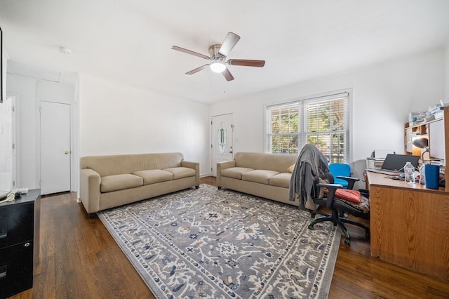 office with dark wood-type flooring and ceiling fan