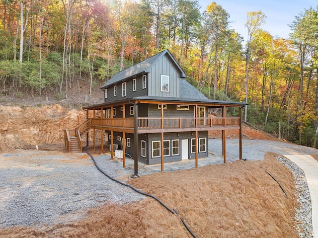 rear view of house with a deck