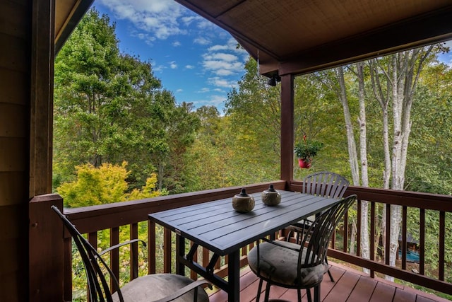 balcony with outdoor dining area