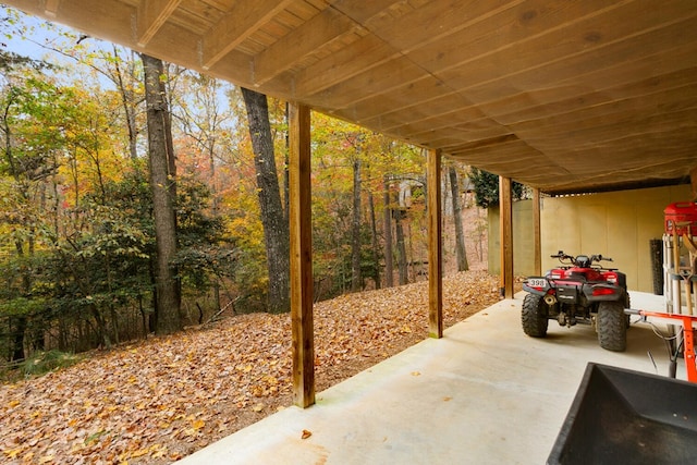 view of patio / terrace with a carport