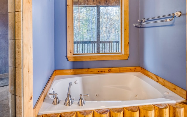 bathroom featuring a washtub