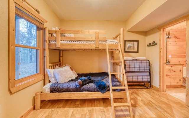 bedroom with light hardwood / wood-style floors