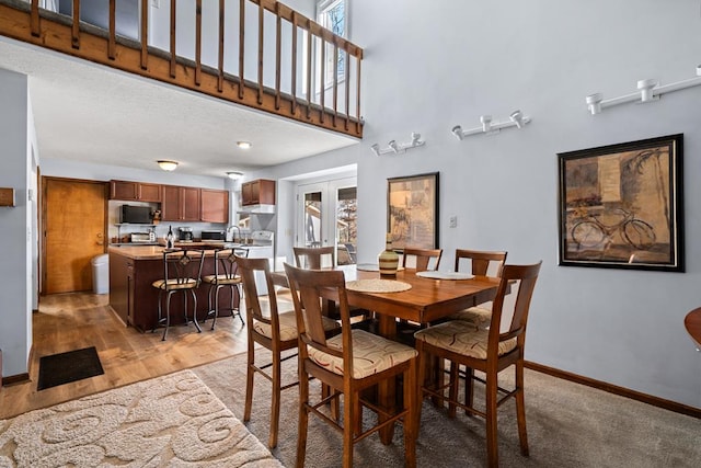 dining area with light wood-type flooring